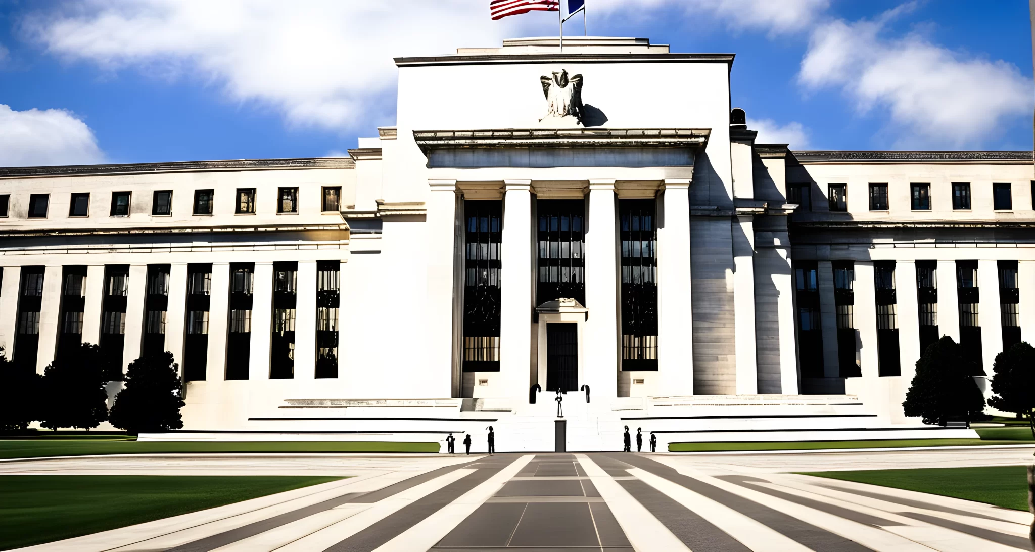 The image depicts the Federal Reserve building in Washington D.C., flanked by American flags.